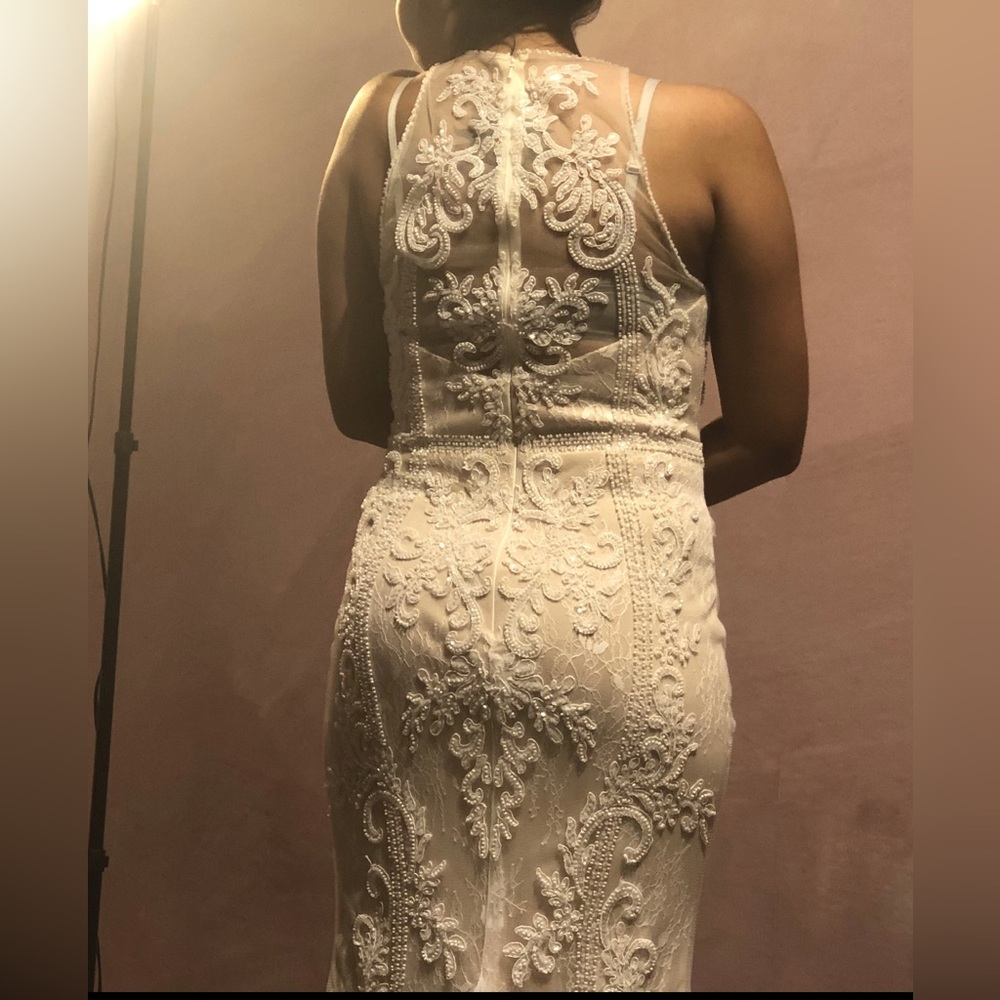 Unaltered wedding dress, never been used, brand new